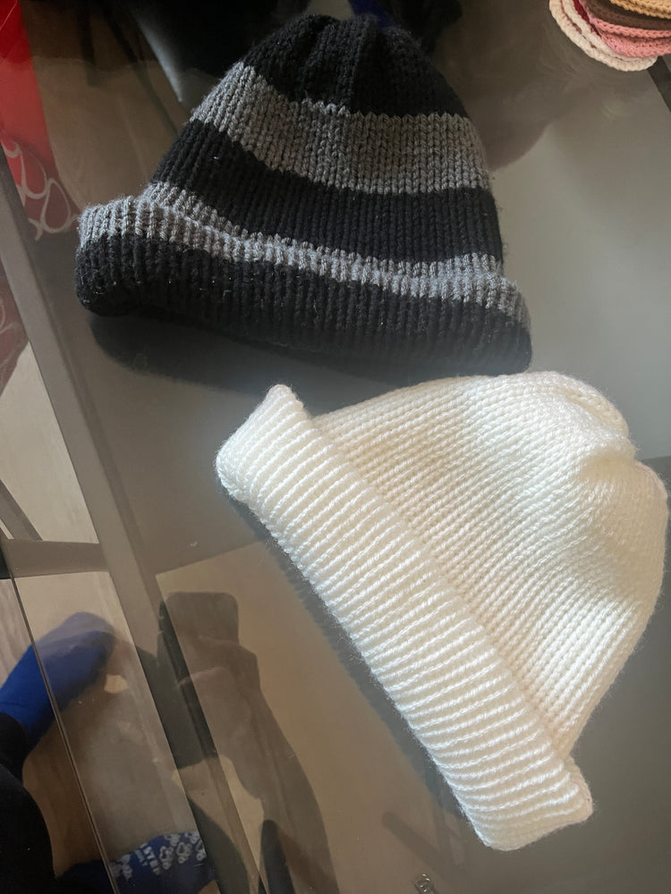 Double layered beanies in pink, gray, navy, green, black and gray stripe, purple and lilac