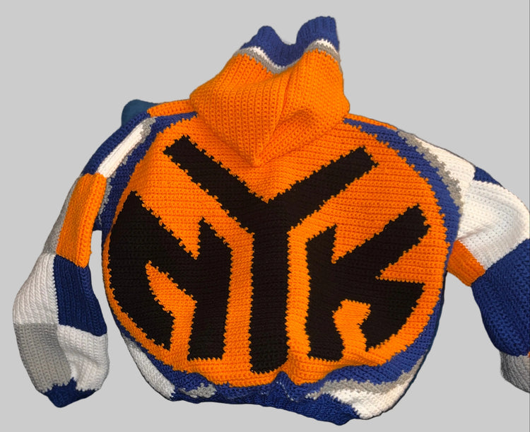 Cardigan back graphic, laid on a couch