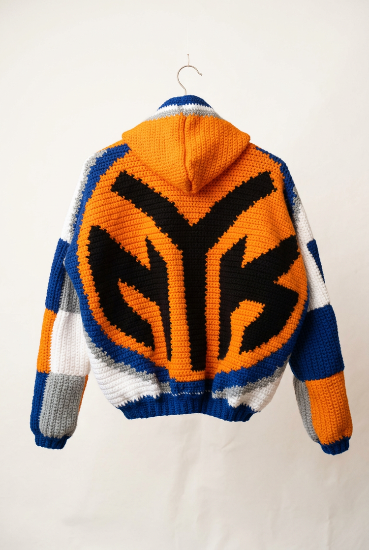 Graphic patchwork crochet cardigan, back view